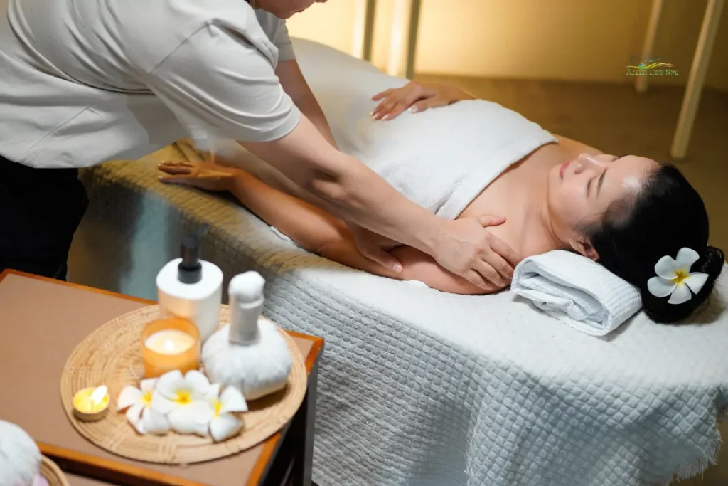 What is aromatherapy massage therapy using natural essential oils to promote relaxation, relieve stress, and support overall physical and emotional wellness.